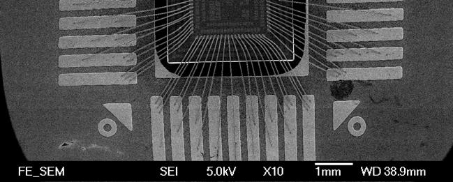 SEM micrographs of (a) a chip bonded with wires, (b) the top view of the 1 st bond (c) the side