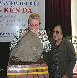 Stone Heritage of East and Southeast Asia Figure 23. Ms. Katherine Muller-Marin, Head of Office of UNESCO Hanoi, attempting to blow the stone horn and play the Tuy An lithophone. Mrs.