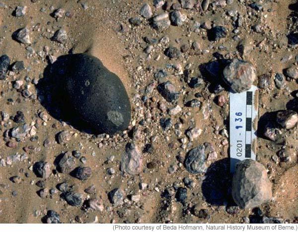 7 of 12 After falling to earth 9700 years ago, meteorite SaU 169 was found in the hot desert of Oman in 2002 by Drs.
