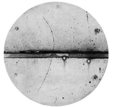 The first confirmation of a positron The first 'fingerprint' of anti-matter. Anderson discovers the trace of a positron in his cloud chamber (in the middle one can see a lead-plate of 6mm thickness).