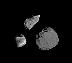 The two Martian moons resemble asteroids Mars has two small, irregularshaped satellites that move in orbits close to the surface of the planet Discovered in 1877 by Asaph Hall (US