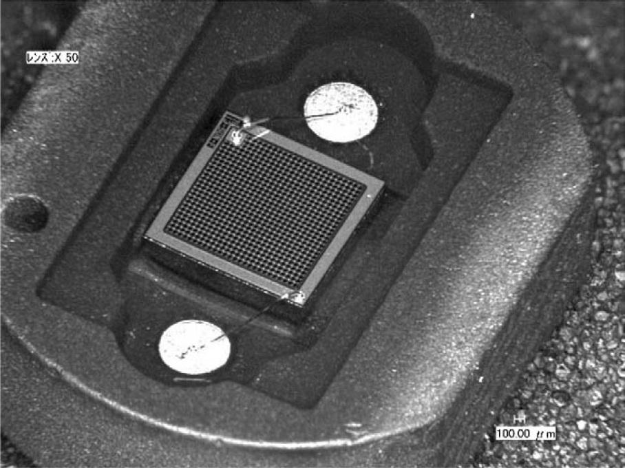 3.1. Photodiode and Silicon Photomultiplier 11 Figure 3.6: Microscope image of Hamamatsu S103612-11-100C silicon photomultiplier [8]. The sensitive area in the middle is 1 1 mm 2 in size.