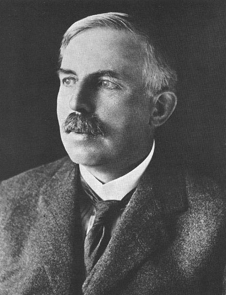 Ernest Rutherford performed the Gold Foil experiment in 1911 which helped him develop the solar system or nuclear model of the atom.