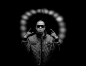 DEVIL HORNS HANDSIGN WHILE STANDING IN FRONT OF A HALO. CAN BEYONCE SEE HIS HALO?