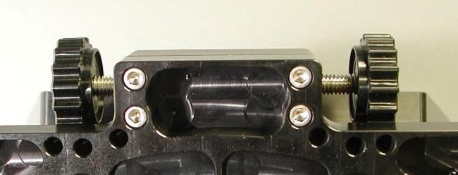 Figure 28: Remove these four screws to access the azimuth nosepiece. (View from the bottom of the mount.) Next, remove the four hex screws that hold the nosepiece in place.