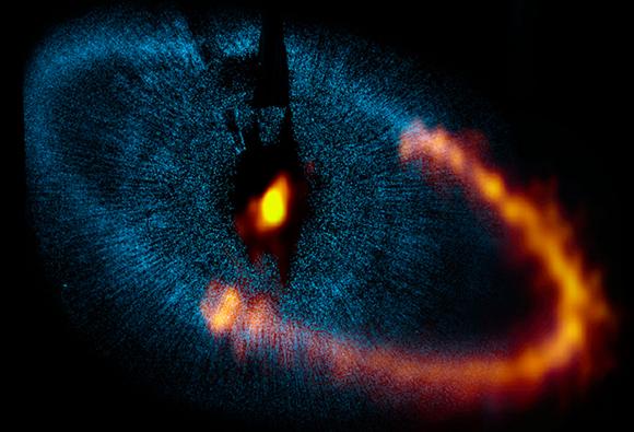 eccentric 130au dust ring with sharp inner edge, the system s Kuiper belt (Kalas et