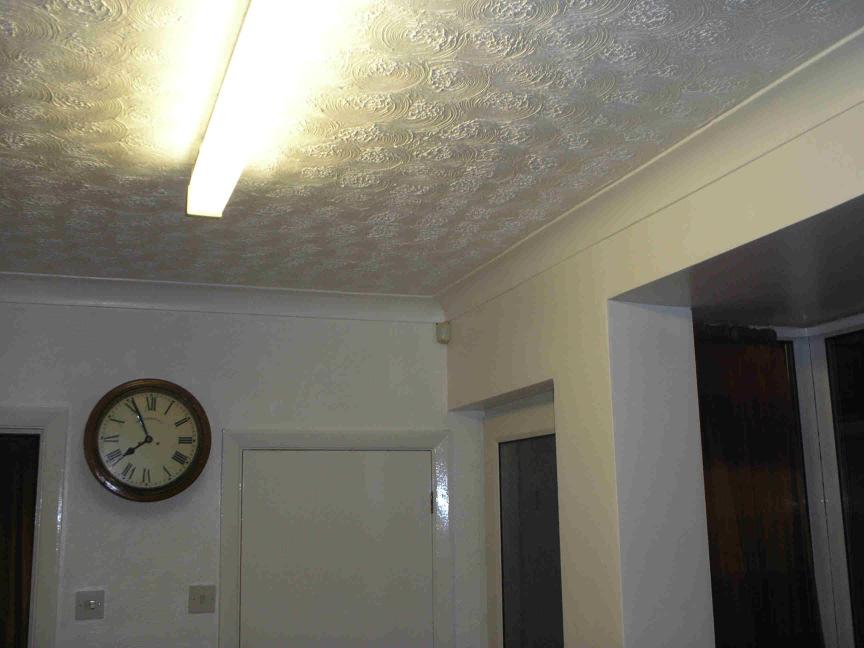 34 C Thermal image taken of the kitchen door area, the dark area above