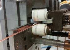 Next step was to develop a tecnique to bond an aluminium strip on the superconducting tape. Titanium and aluminum cannot be directly soldered together.