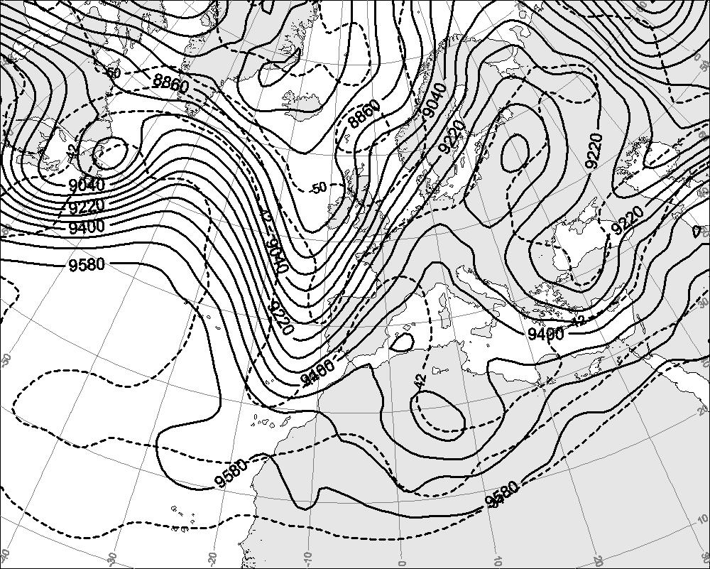 Dashed line in b) depicts the eliminated PV anomaly at 300 hpa.