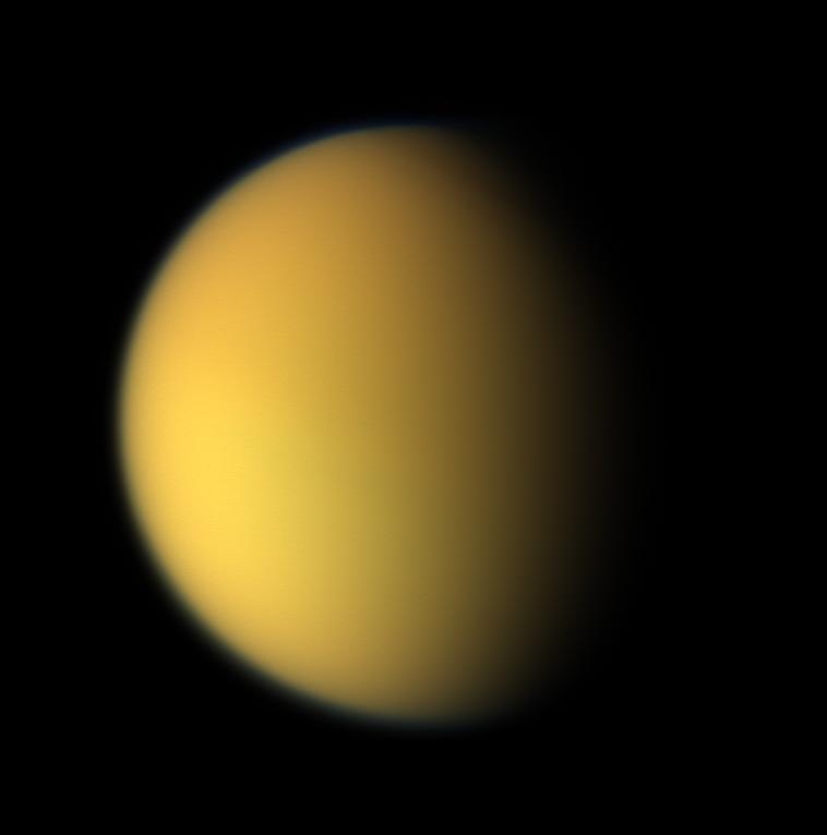 2. TITAN Flasar et al. 2005; Atreya et al. 2006; Achterberg et al. 2008). Fig. 2.1: Different views of Titan.