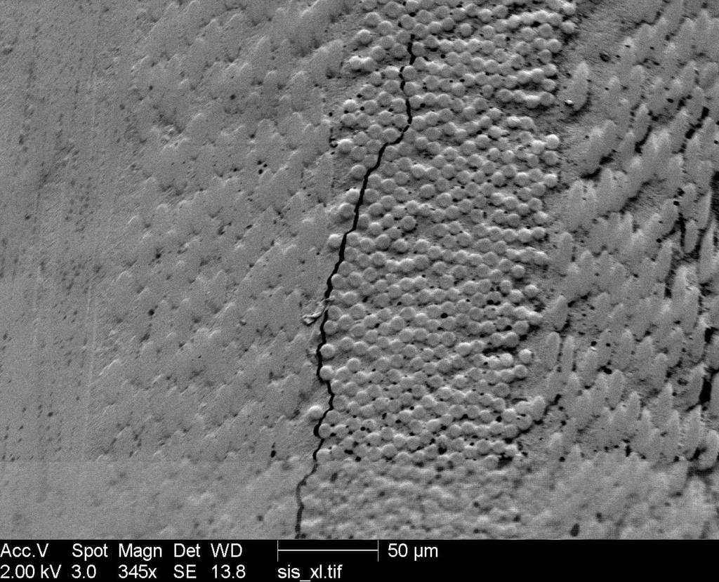 subjected to a delamination initiation stress of 15.79 Ksi. In the right hand side image of Fig.4.