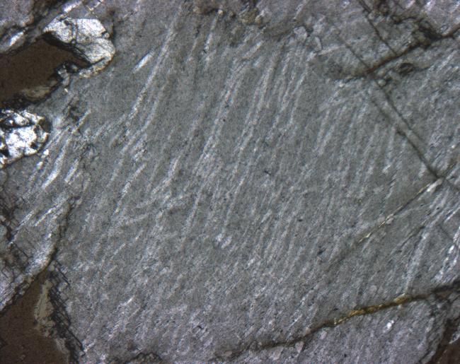 A) Typical massive megacrystic charnockite.