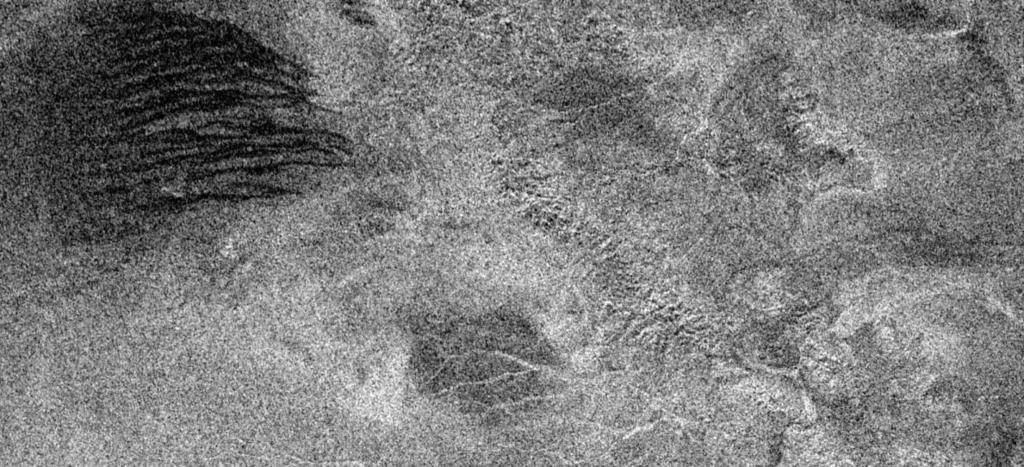 Exploring Titan Radar shows the surface of Titan is very Earth-like: mountains, dark sand dunes,
