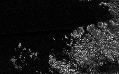 Exploring Titan Cassini radar images of the north pole