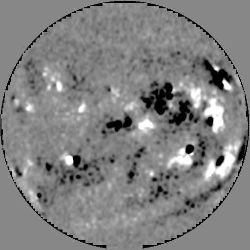 Below all four images is a gray level bar indicating the relationship between the image darkness and the assigned magnetic field value. spectral lines Ni i 676.8 nm and Fe i 525.