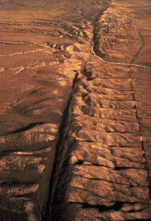 The San Andreas fault zone, which is about 1,300 km long and in places tens of kilometers wide, slices through two thirds of the length of California.