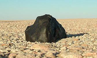 What is a meteorite? A meteorite is a meteor that impacts the ground without being destroyed. This meteorite (409 gram) was discovered in Saudi Arabia by Meteorite Recon in April 2008.