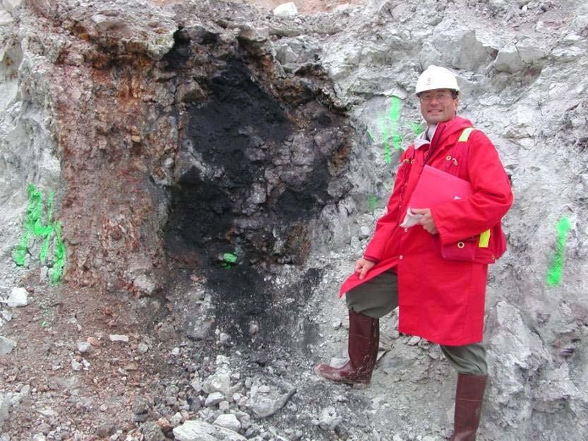 UNCONFORMITY-RELATED URANIUM DEPOSITS Arises from geochemical changes near a major