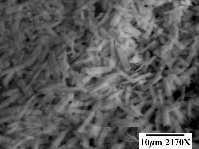 D-5 Figure D.2: Scanning electron micrograph of solids from becquerelite synthesis. 200 Intensity 100 becquerelite schoepite 0 100 300 500 700 900 Raman Shift (cm -1 ) Figure D.