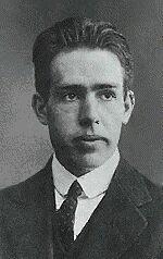 Bohr s Atom (1913) Bohr thought of electrons moving around the nucleus like planets around the Sun.