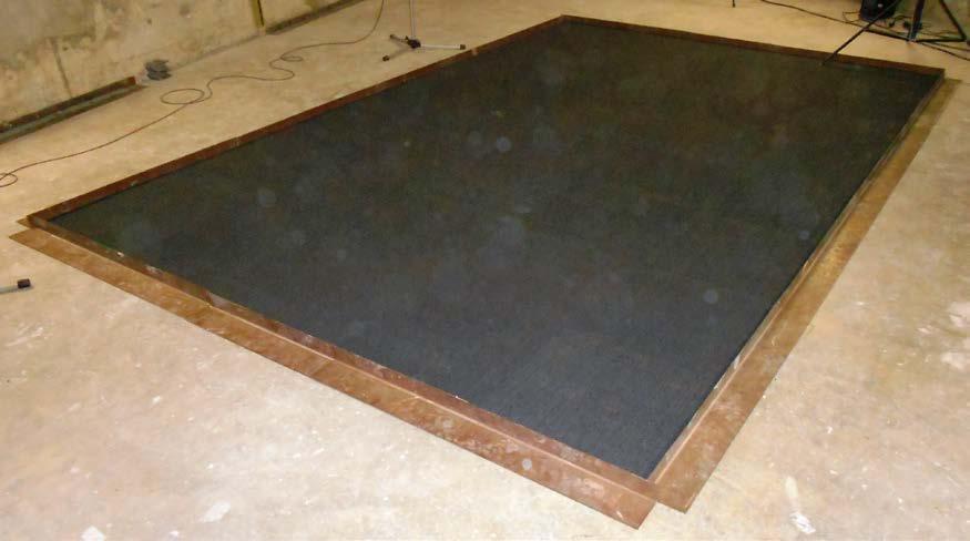 Figure 2: Interface PET CushionBacRE 780 g/m 2 500mm x 500mm Carpet Tiles installed into the Reverberation Chamber for testing. 4.