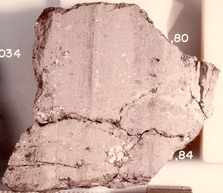 Figure 13: Sawn surface of 12034,80 (butt end). NASA S75-34244. Simon S.B., Papike J.J. and Gosselin D.C. (1985) Petrology and chemistry of Apollo 12 regolith breccias. Proc. 16 th Lunar Planet. Sci.