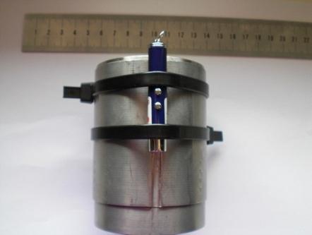 6 th International Congress of Metrology Front 4 3 Figure 4. Lateral view of irradiator with a mini-laser tied to it Back 2 Figure 6.The axis where measurements were done.
