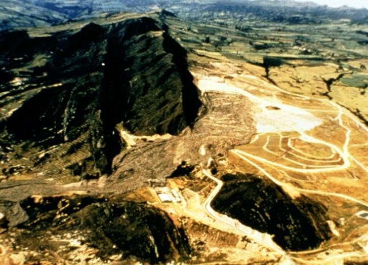 Figure 3: Photo of landfill slope failure in South America caused by excessive deep interior injection well pumping activity into light-weight lift compacted solid waste fill materials Deep injection