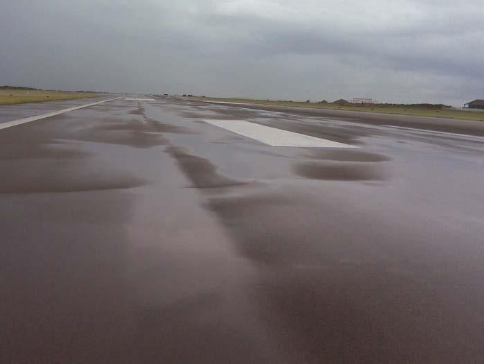 Runway Condition Wet Runway Runway ability to drain water is a function of: - cross slope,
