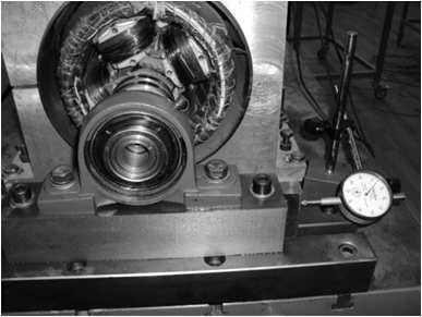 422 Akbari, Meshgin-Kelk, and Milimonfared Figure 11. A clock for checking the correct position of bearings.