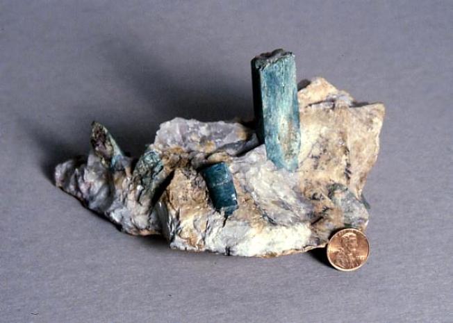 Photo from the Maine State Museum Mount Apatite Park, Auburn, ME Minerals at Mount Apatite The Greenlaw dumps are the most favorable area in which to find traces of green and blue-green tourmaline