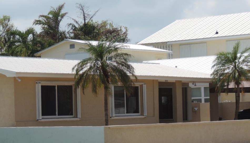 One of the many undamaged metal roof single-family dwellings in the Key West Manufactured homes Our team visited four mobile home parks in the study region.
