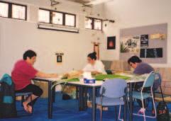 The weaving team at UNITEC, June 2000. Cath and Kahu in discussion.