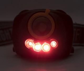 It has both white and red LEDs, two pushbuttons on its top that control the white and red LEDS and their brightness, and it does exactly what I ve been looking for.
