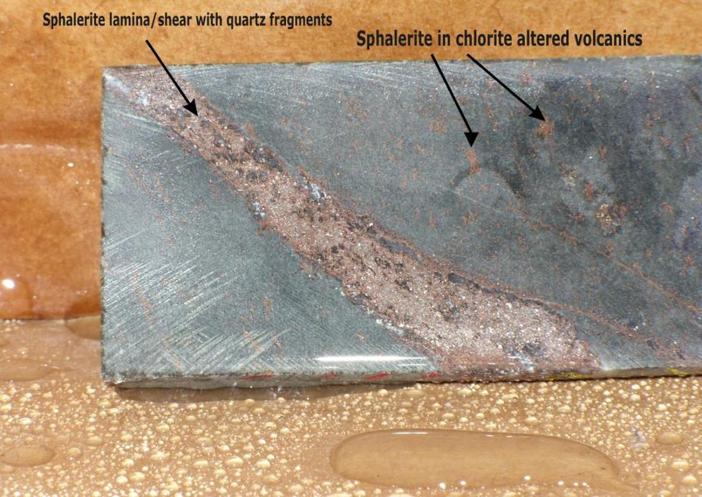 Sphalerite lamina with quartz fragments Sphalerite in chlorite altered volcanics Figure 34. DDH SXL-4 @ 297.0.
