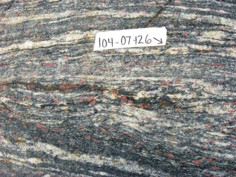 (Zwanzig and Murphy, GS-8, this volume); f) Sickle Group sillimanite-biotite gneiss with ﬂattened
