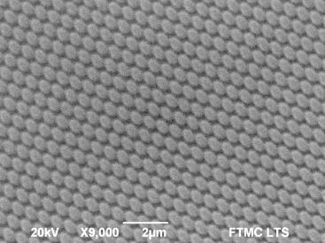 Nanostructures array with 600 nm period fabricated by four-beam interference lithography: a) SEM micrograph; b) AFM image tilted by 45 deg; c) The profiles of nanostructures marked in b) (=600 nm).
