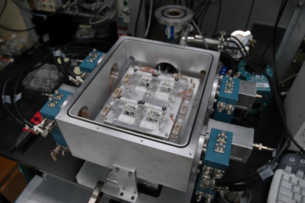 Appendices Figure B.6. Photograph of the multi-detector cryostat with four detectors loaded for testing.
