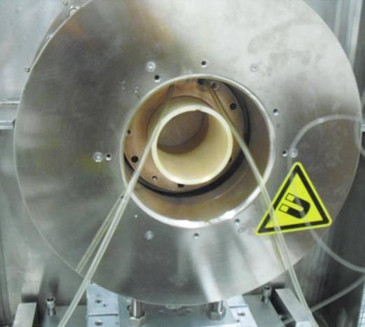 4.2 The Versatile Ion Source (VIS) 101 Figure 4.2.6: Positioning of the alumina tube within the plasma chamber. The water-cooling system is also visible.