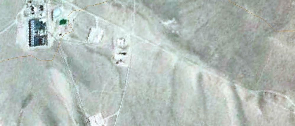 Faulting is from Faulds et al., 2010. Only wells utilized during the first 20 years of production are symbolized. Newer production wells are located on the pads south, ENE, and NE of the power plant.
