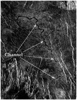 ) The bright lava flows are estimated to be no more than 10 million years old. This Magellan image shows a part of a long, meandering, 2 km-wide channel.