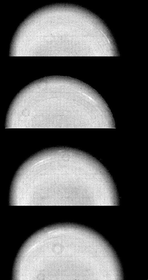 Time-lapse Voyager 2 images of Uranus show the movement of two small, bright, streaky clouds -- the first such features ever seen on the planet.