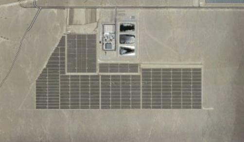 The red shading shows the polygon footprints, while the blue dots show the simulation containers representing either houses (Ota City), or small groups of PV modules (Copper Mountain).