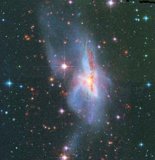 NGC 6240: Merger of two gas-rich spiral galaxies A starburst galaxy (very intense star formation) Hosts 2 black holes, one from each galaxy AO