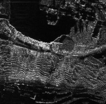 Figure 4: First two: InSAR images in north side-looking and south side-looking. Last: image after shadow processing.