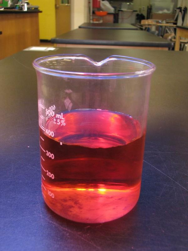 #3) Red dye in water 3 drops of red food coloring are added to water.