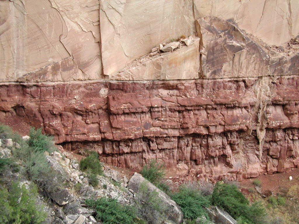 The striking contrast between the light buff colored Coconino Sandstone and the muddy red Hermit Shale is cause for this portrait of a rock wall along the Bright Angel trail in the Grand Canyon.
