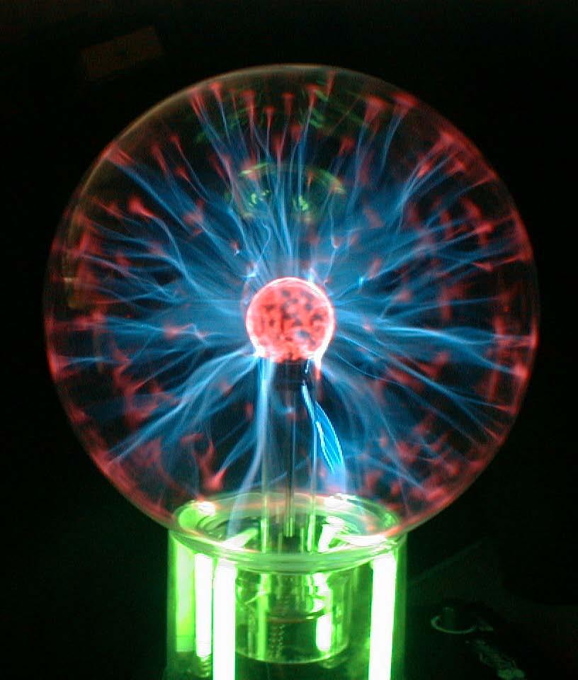 Commercial plasma balls contain mixtures of helium, neon, argon, and other gases.