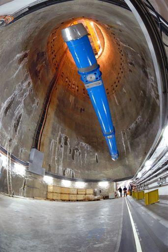 LHC steering magnet being lowered into place (the