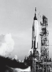 An Atlas launch vehicle, with a Mercury space capsule at the top, underwent a static firing test to verify engine systems